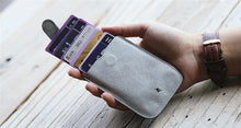 将图片加载到图库查看器，The Wallet With a Trick Up Its Sleeve
