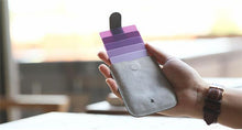 将图片加载到图库查看器，The Wallet With a Trick Up Its Sleeve
